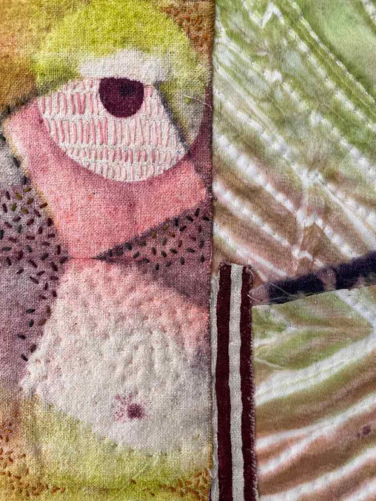 Tumble detail, textile collage, dye, quilting, embroidery
